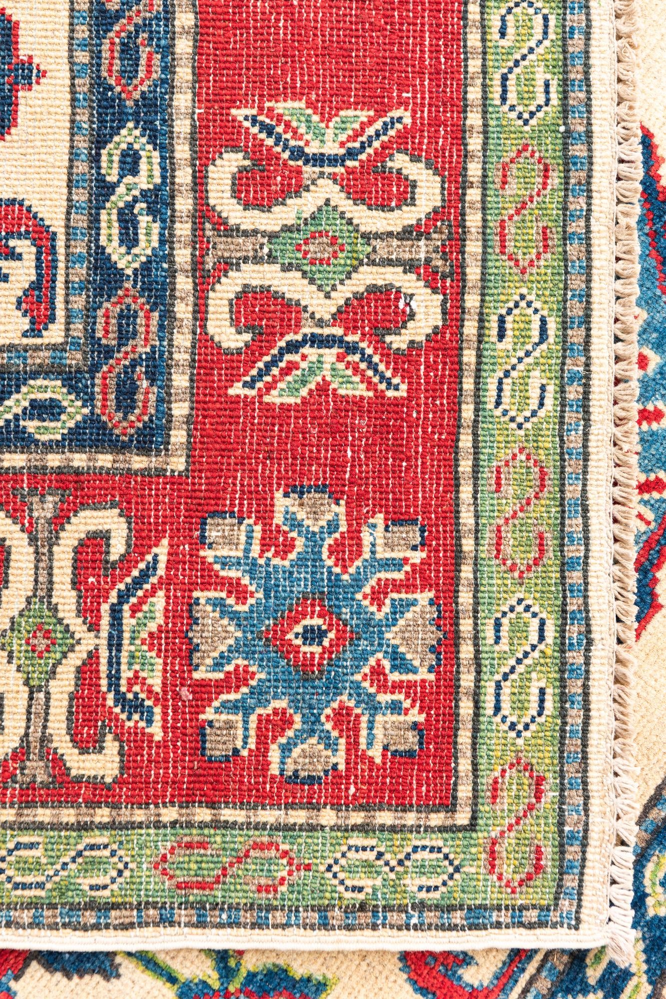 5' 1 x 6' 9 Hand Knotted Kazak Rug