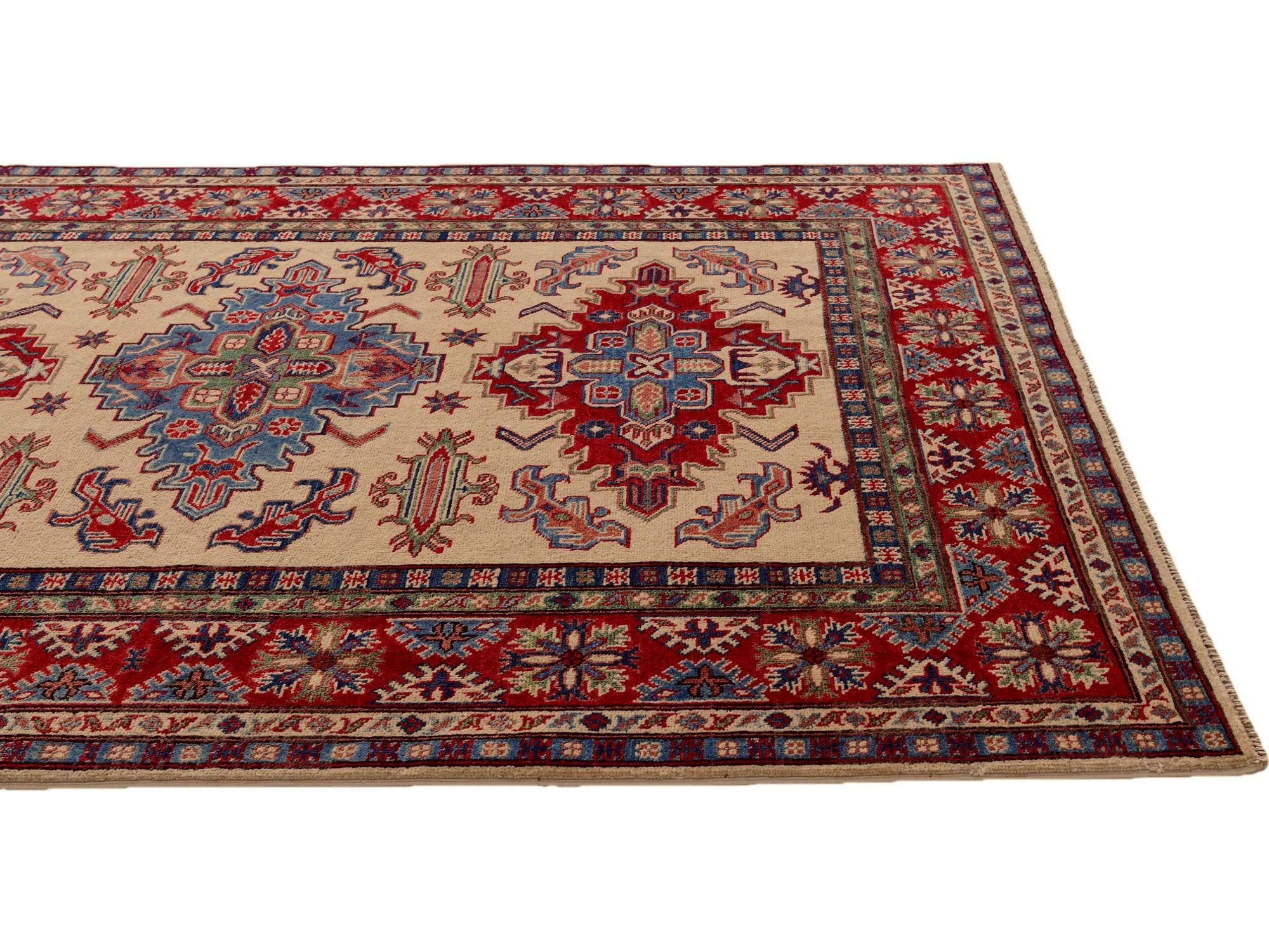 5' 7 x 7' 9 Hand Knotted Kazak Rug