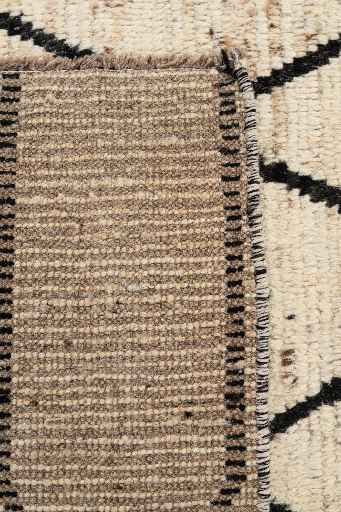5' 11 x 8' 9 Hand Knotted Moroccan Wool Rug