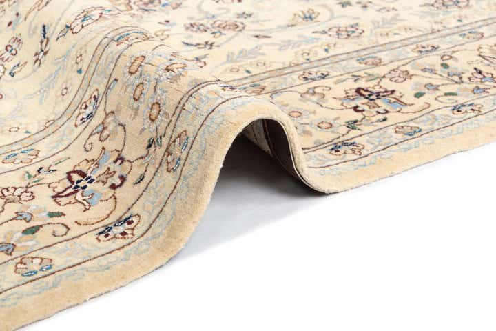 4' 2 x 6' 5 Nain Rug