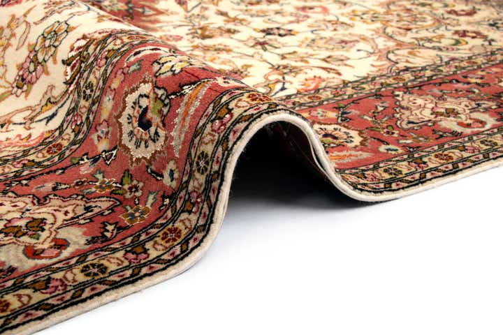 5' x 6' 11 Tabriz Rug