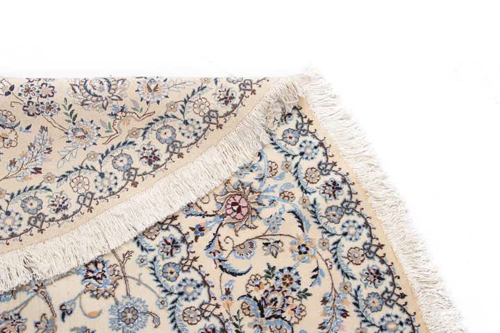 8' 1 x 8' 1 Nain Round Rug
