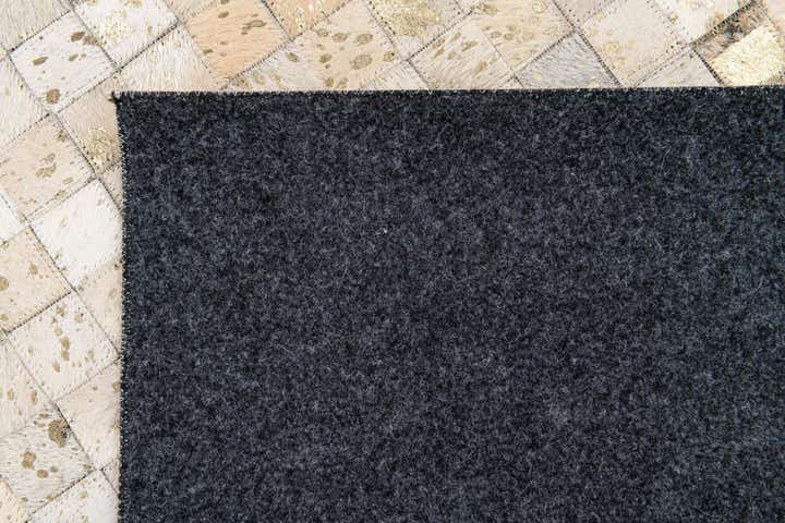 5' 2 x 7' 6 Cowhide Stocks Rug