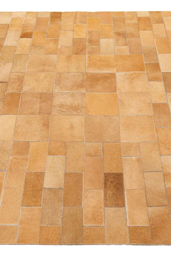 5' 2 x 8' 1 Cowhide - Patchwork Rug