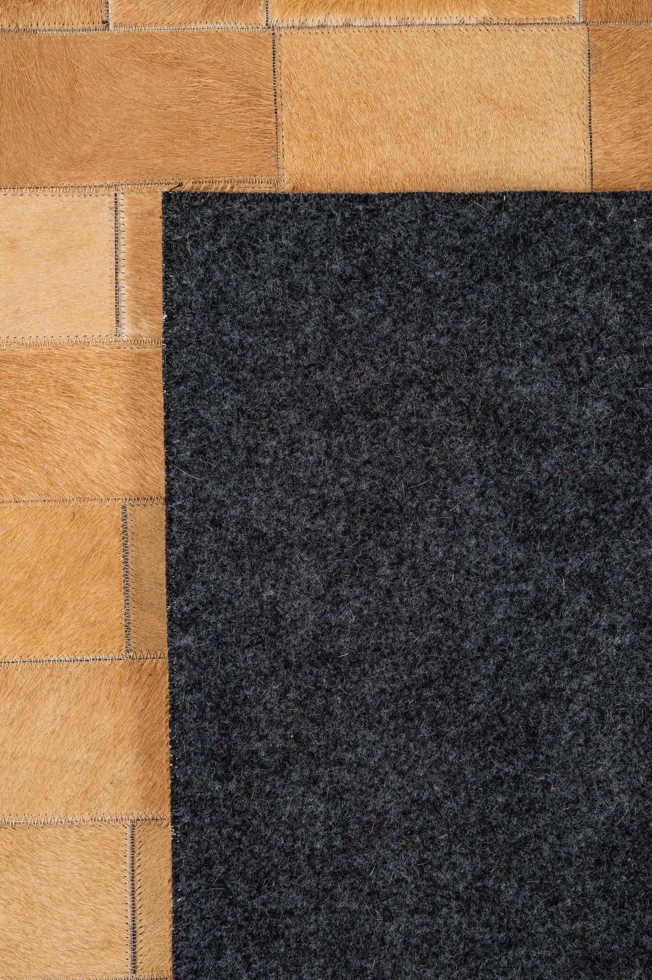 5' 2 x 8' 1 Cowhide - Patchwork Rug