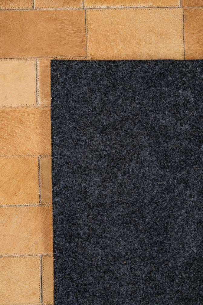 5' 2 x 8' 1 Cowhide - Patchwork Rug