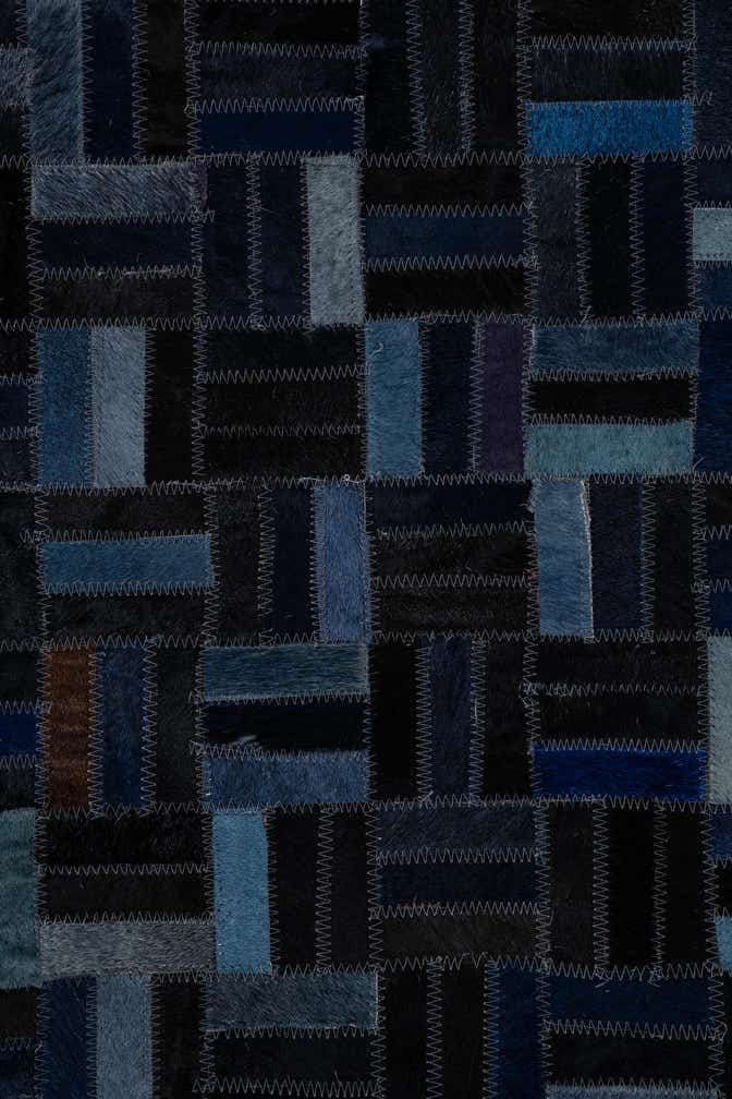 5' 1 x 7' 10 Cowhide Leather Rug