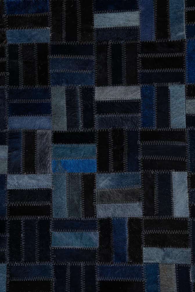 5' 1 x 7' 10 Cowhide Leather Rug