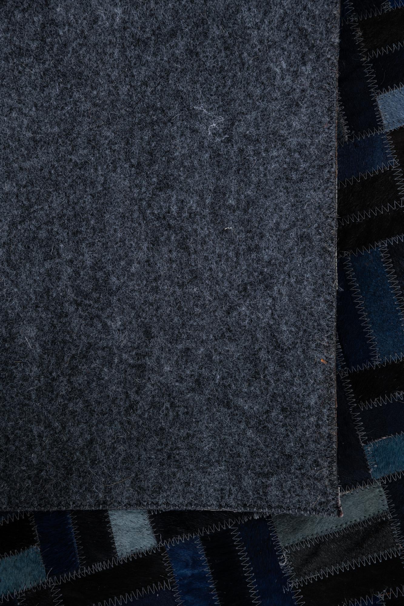 5' 1 x 7' 10 Cowhide Leather Rug