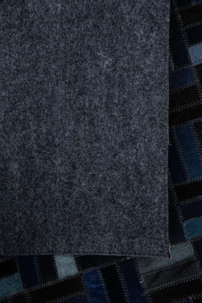 5' 1 x 7' 10 Cowhide Leather Rug
