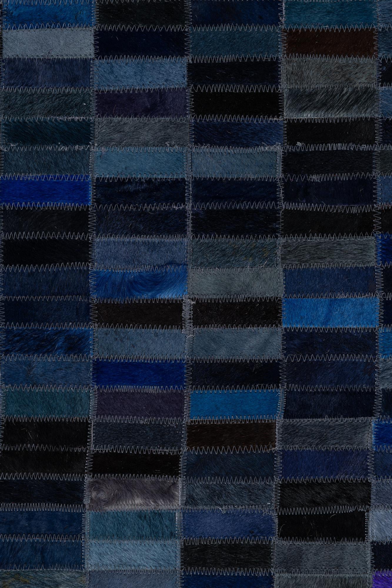 5' 2 x 7' 10 Cowhide Leather Rug
