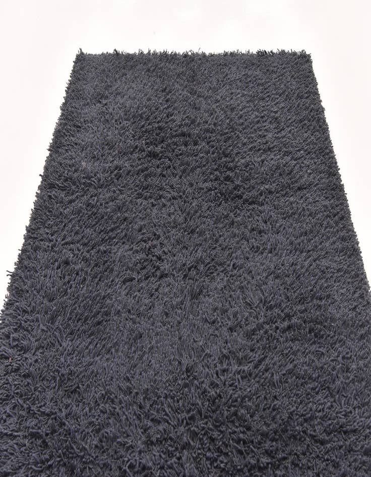 Detail image of 5' 7 x 7' 5 Solid Shag Rug