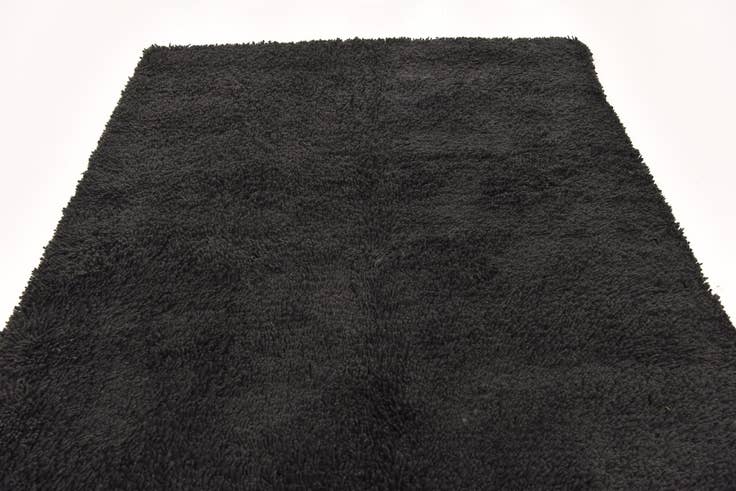 Detail image of 5' 7 x 7' 7 Solid Shag Rug