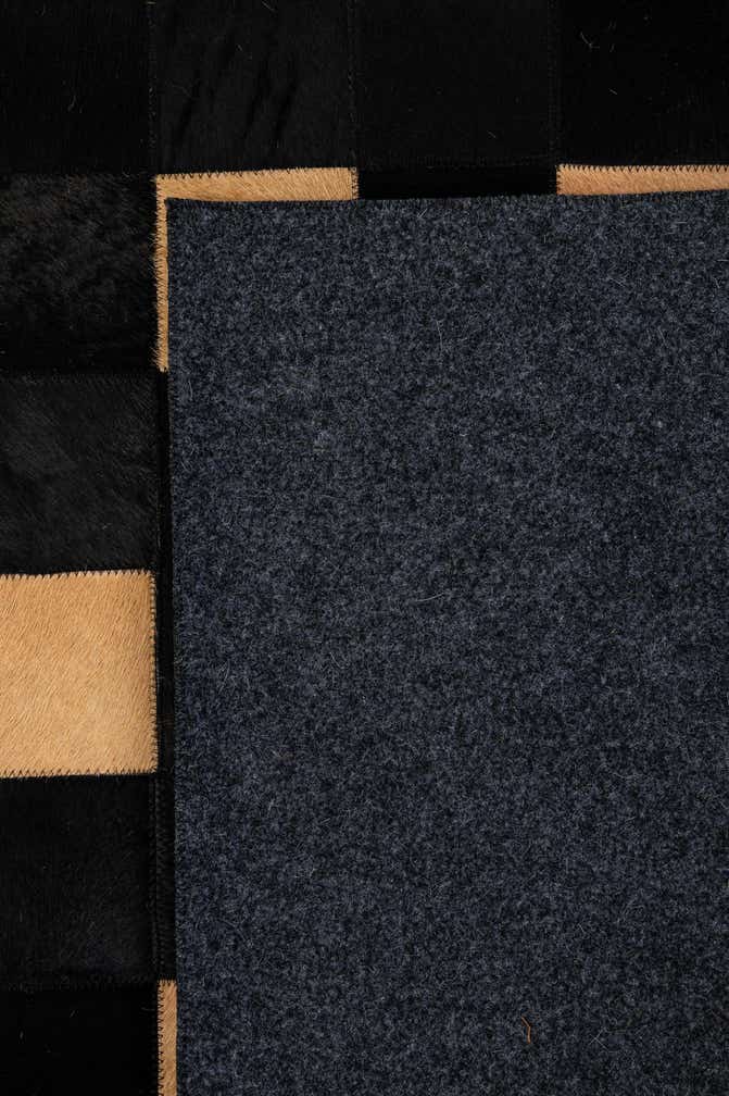 8' 1 x 9' 11 Cowhide - Patchwork Rug