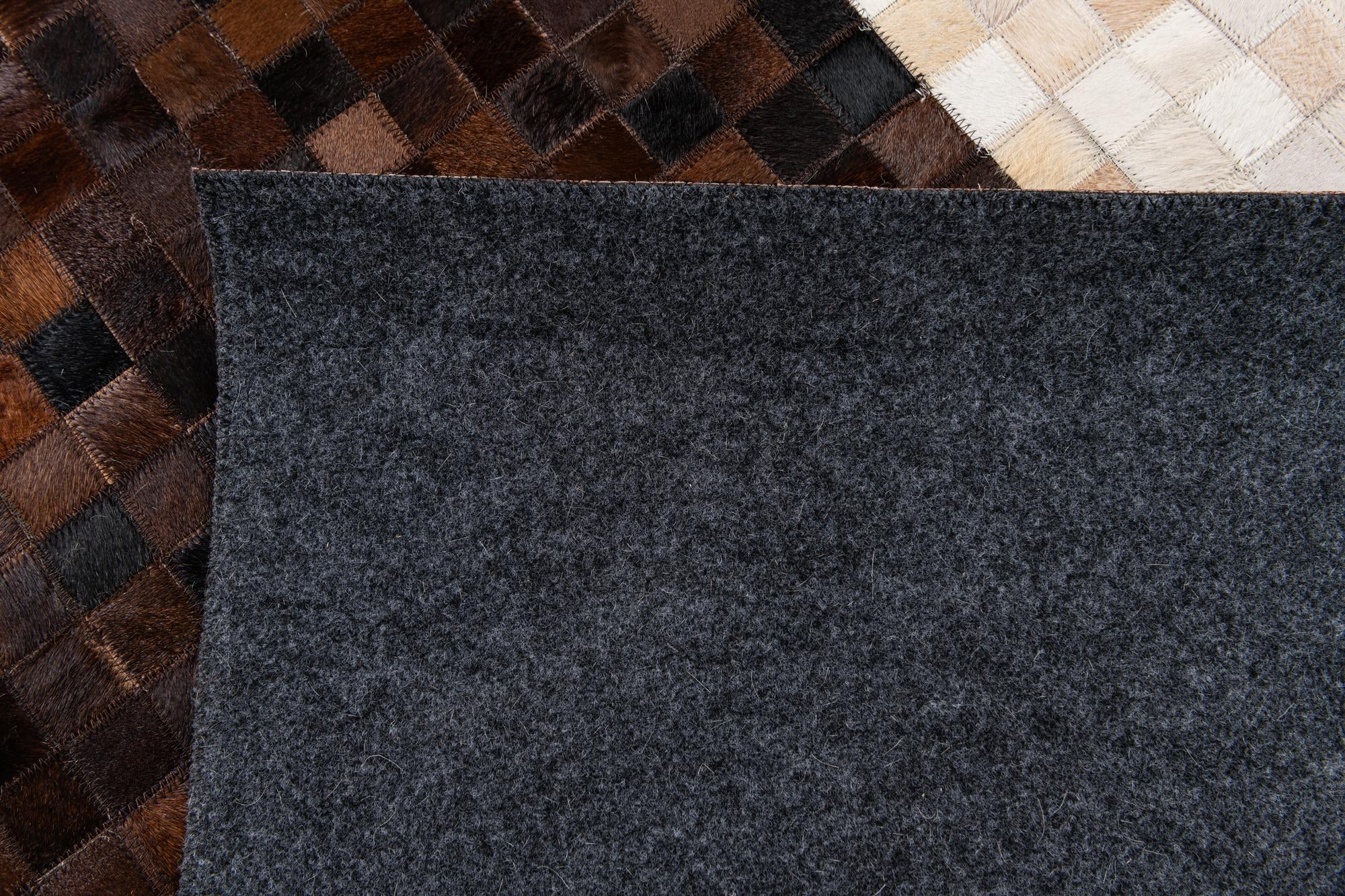 8' 1 x 9' 11 Cowhide & Leather Rug