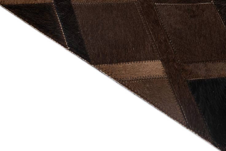 Detail image of 4' 11 x 8' 3 Cowhide - Patchwork Rug