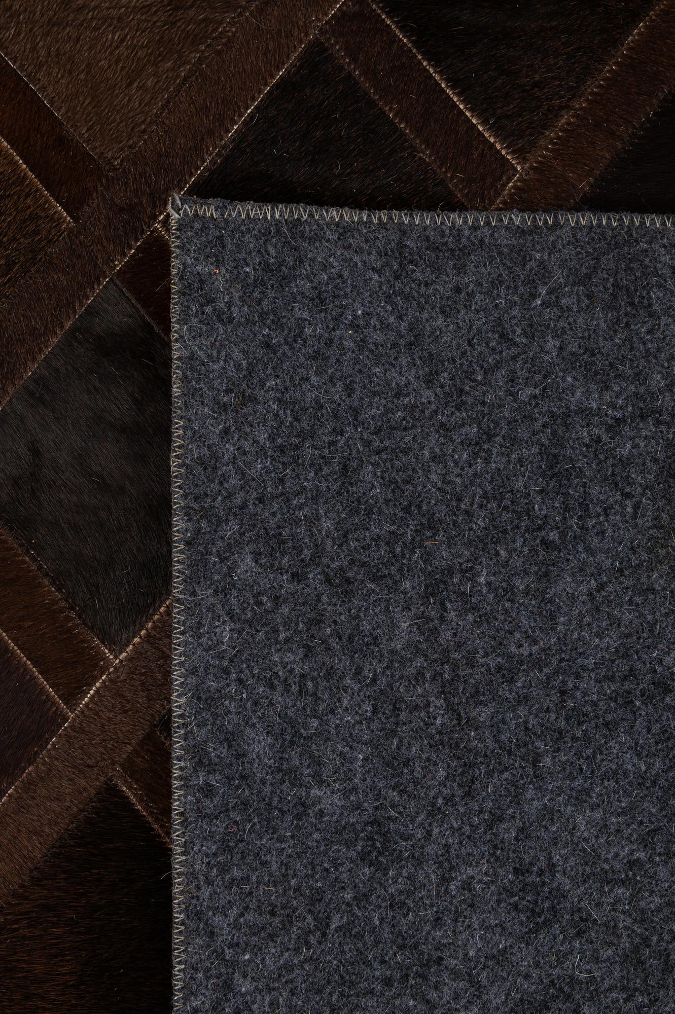 4' 11 x 8' 3 Cowhide - Patchwork Rug
