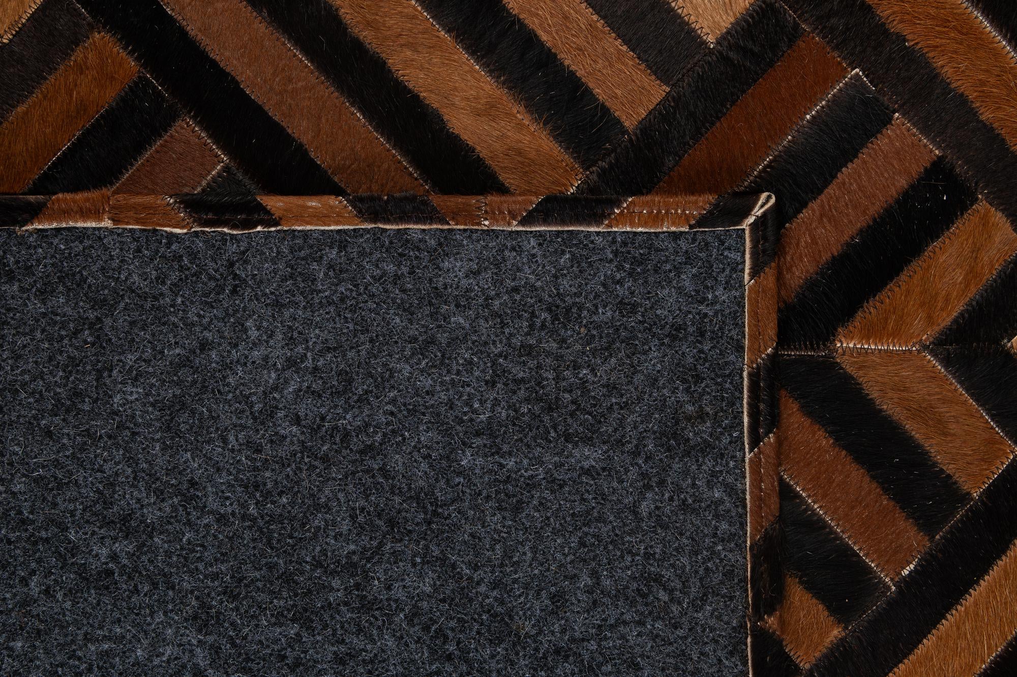 5' 1 x 7' 11 Cowhide - Patchwork Rug