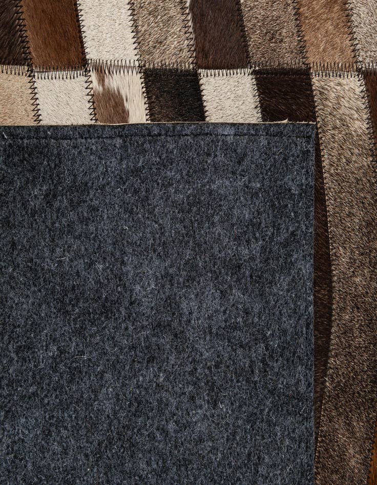 Detail image of 5' 1 x 7' 10 Cowhide - Patchwork Rug