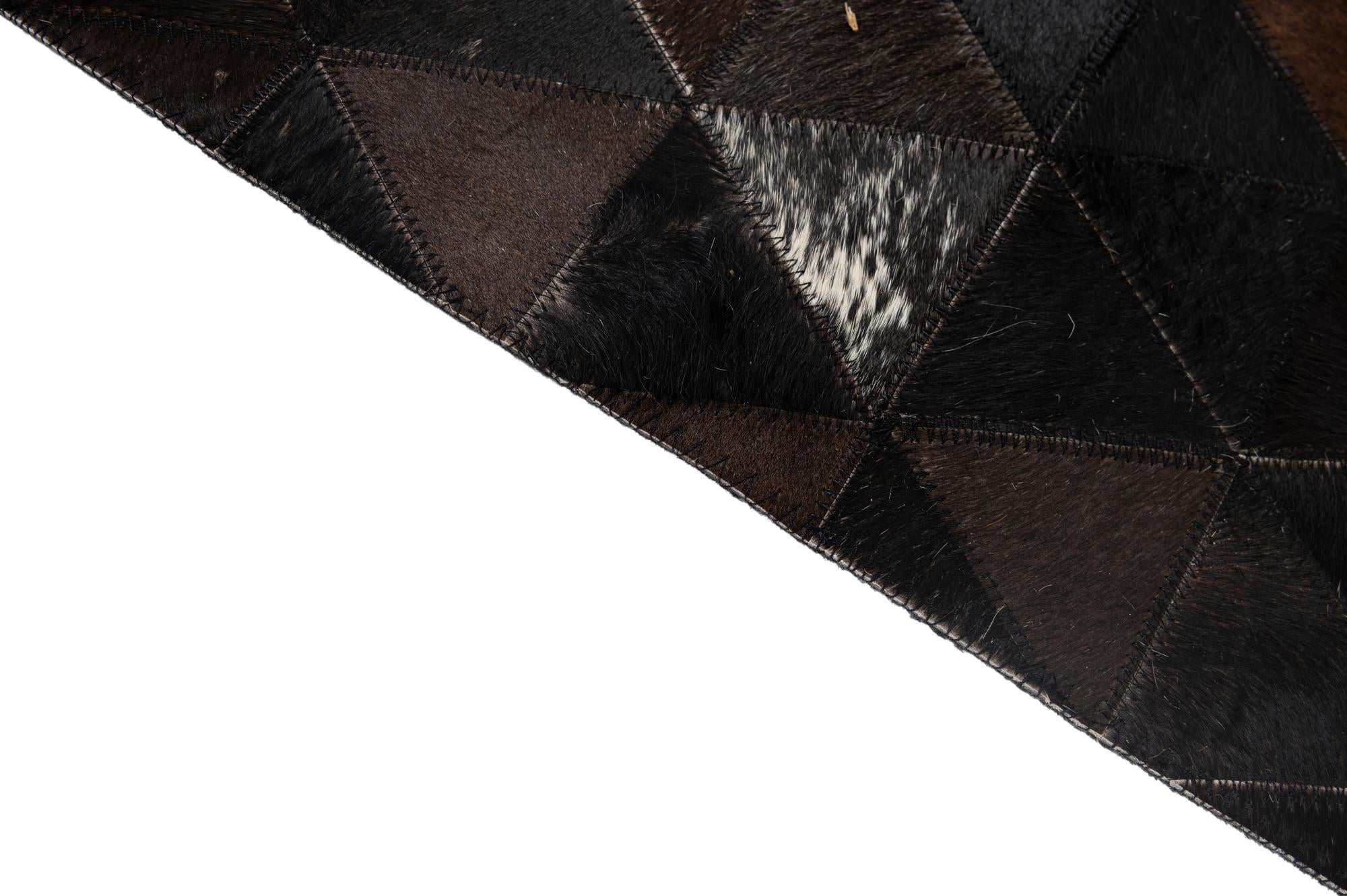4' 11 x 7' 11 Cowhide - Patchwork Rug