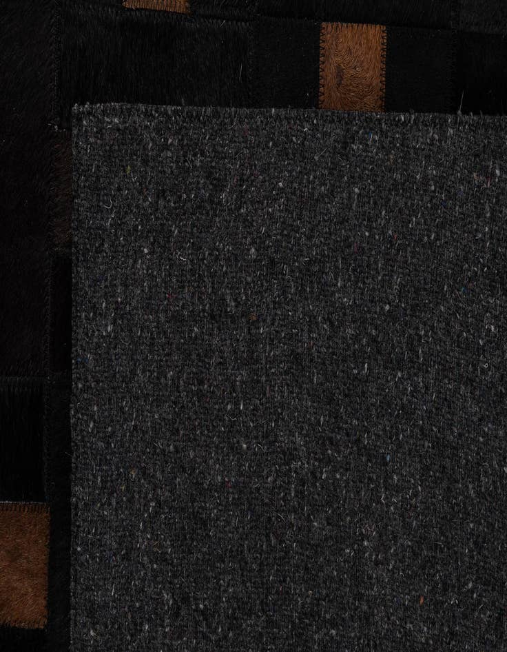 Detail image of 5' 1 x 8' 3 Cowhide - Patchwork Rug