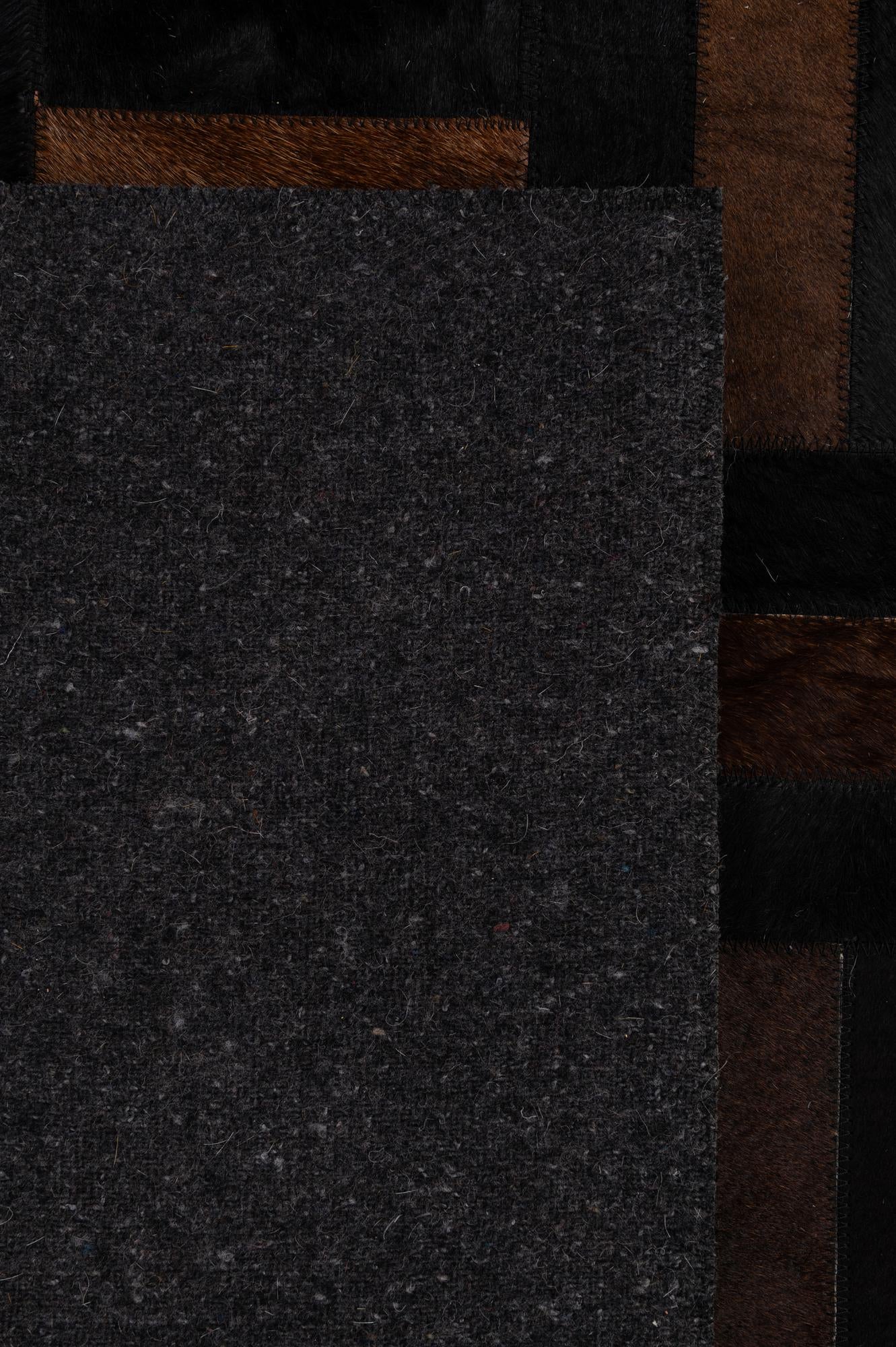 5' 3 x 8' 2 Cowhide - Patchwork Rug