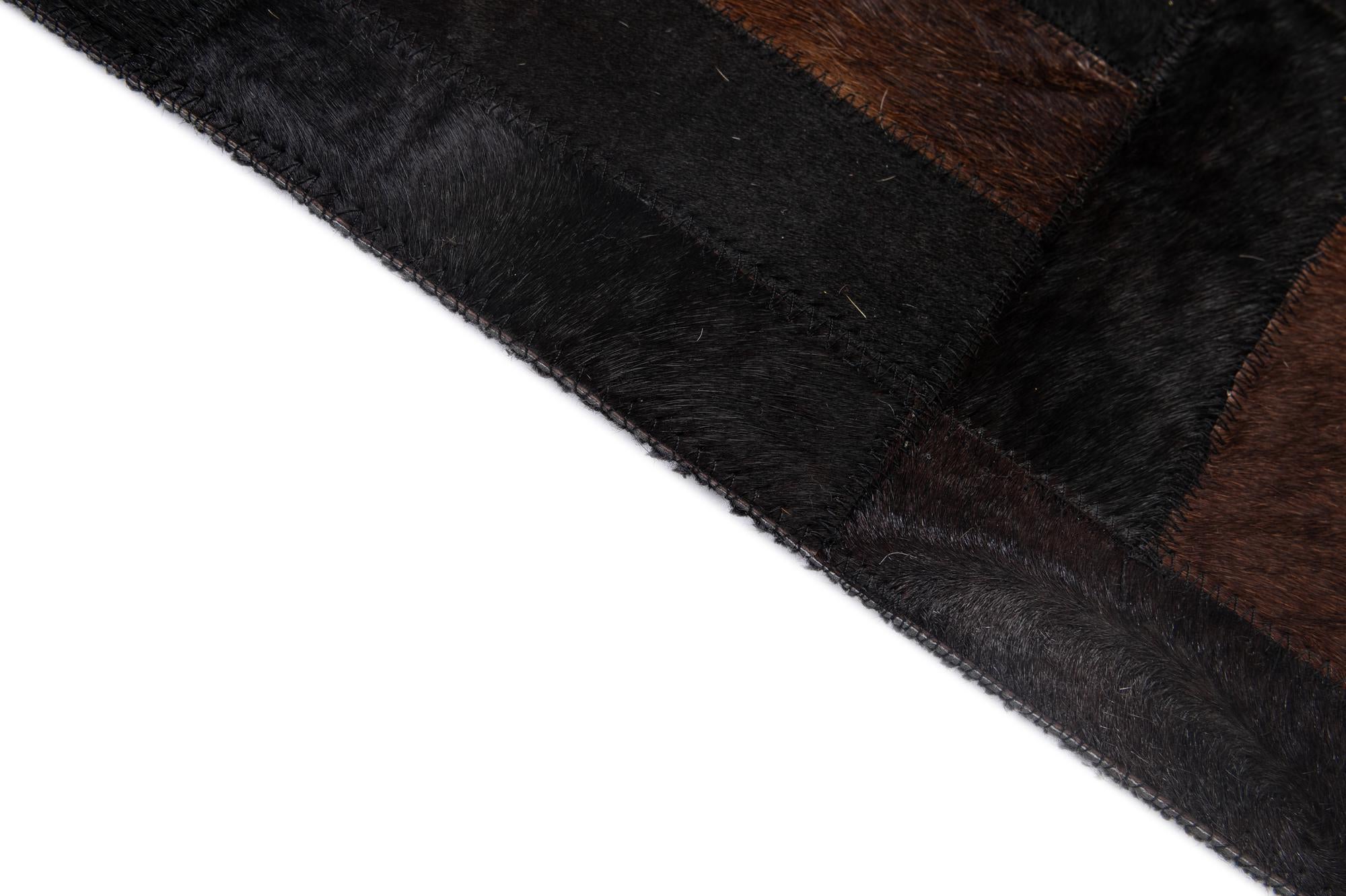 5' 3 x 8' 2 Cowhide - Patchwork Rug