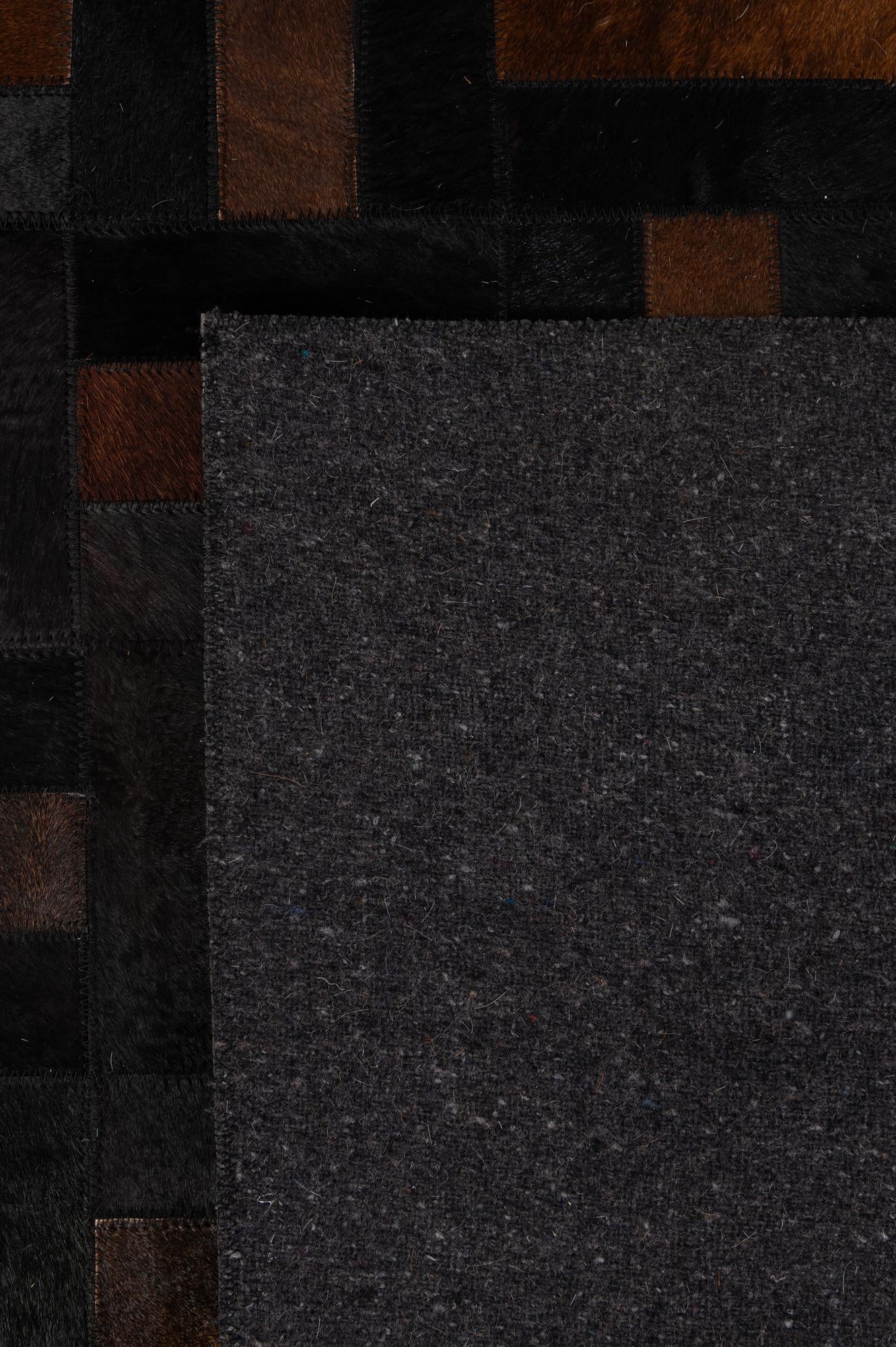 5' 3 x 8' 2 Cowhide - Patchwork Rug