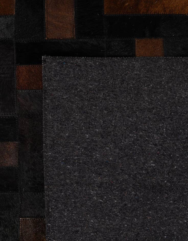 Detail image of 5' 3 x 8' 2 Cowhide - Patchwork Rug