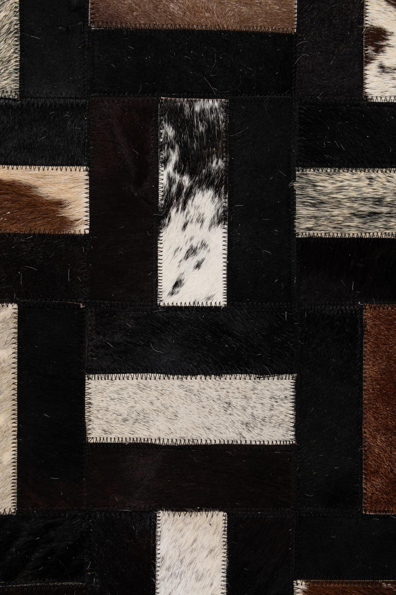 5' 3 x 8' 1 Cowhide - Patchwork Rug