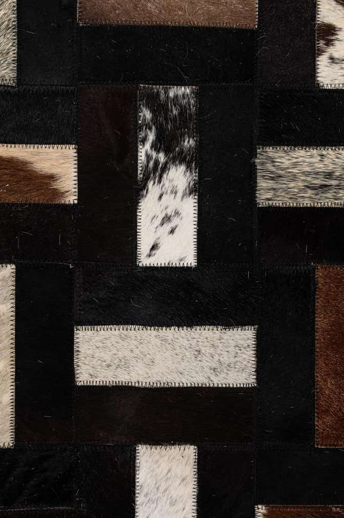 5' 3 x 8' 1 Cowhide - Patchwork Rug