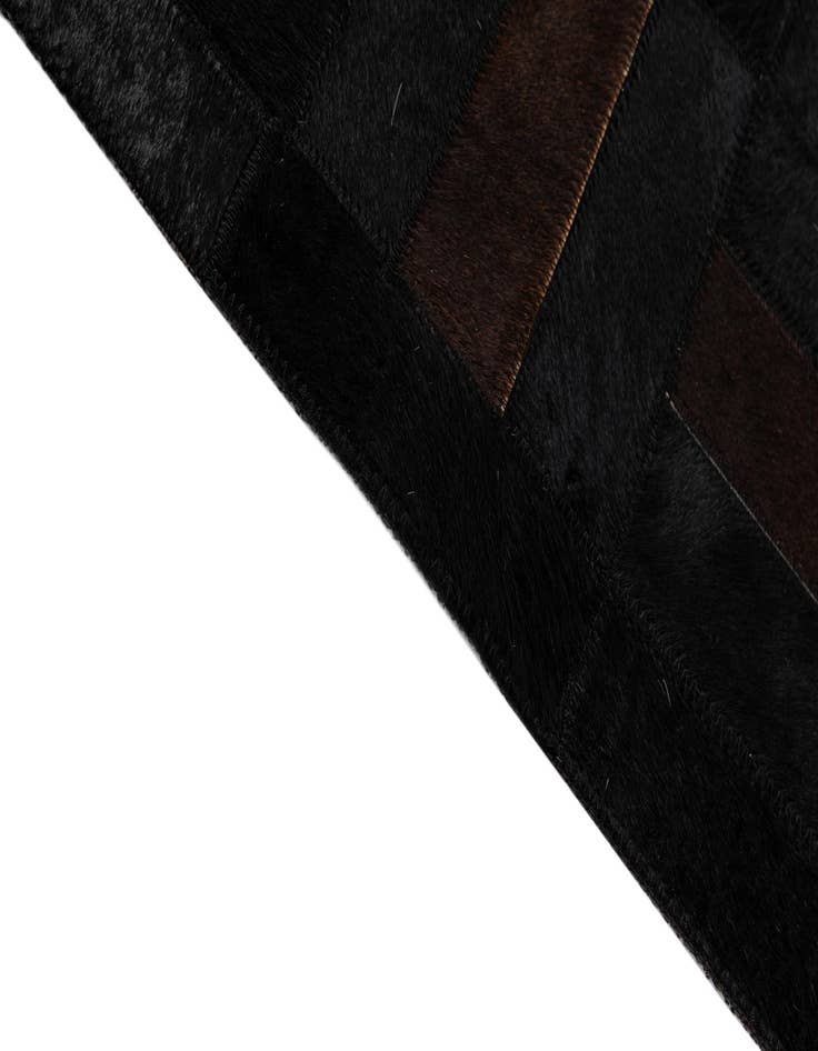 Detail image of 5' 3 x 8' 2 Cowhide - Patchwork Rug