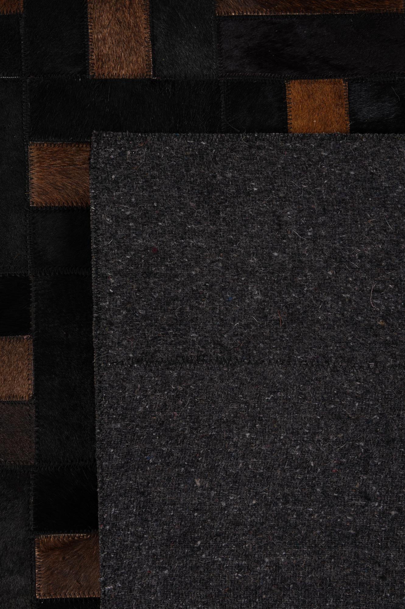 5' 3 x 8' 2 Cowhide - Patchwork Rug