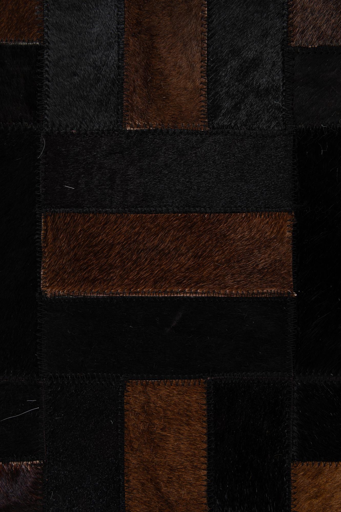 5' 3 x 8' 1 Cowhide - Patchwork Rug