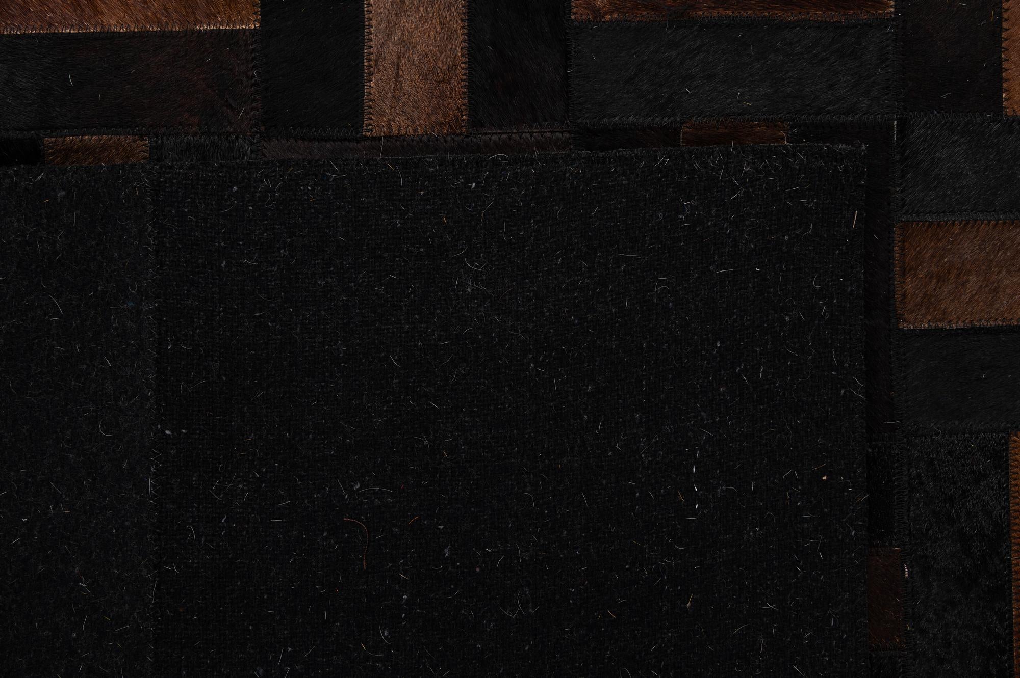 5' 2 x 8' 1 Cowhide - Patchwork Rug