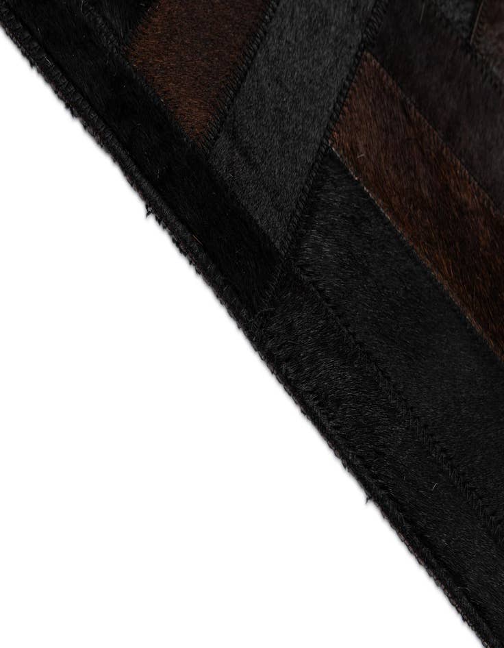 Detail image of 5' 3 x 8' 2 Cowhide - Patchwork Rug