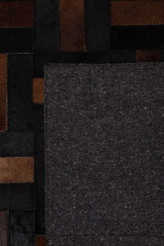 5' 3 x 8' 1 Cowhide - Patchwork Rug