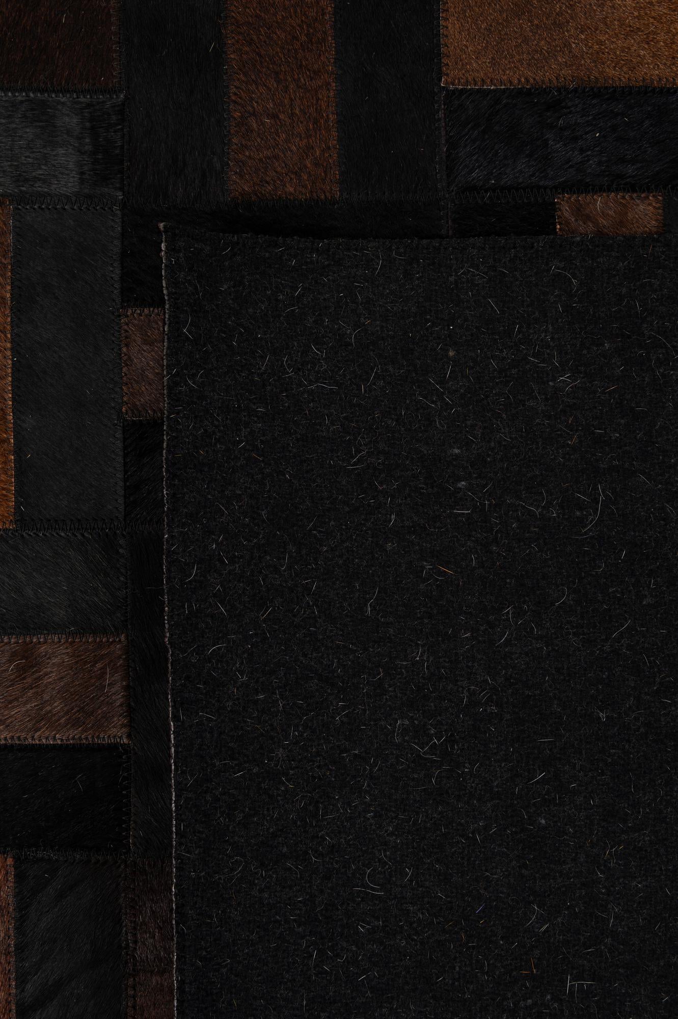 5' 3 x 8' 1 Cowhide - Patchwork Rug