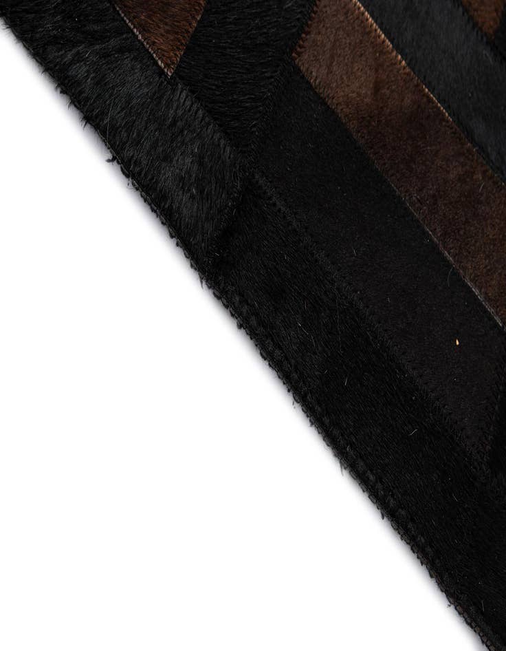 Detail image of 5' 3 x 8' 2 Cowhide - Patchwork Rug