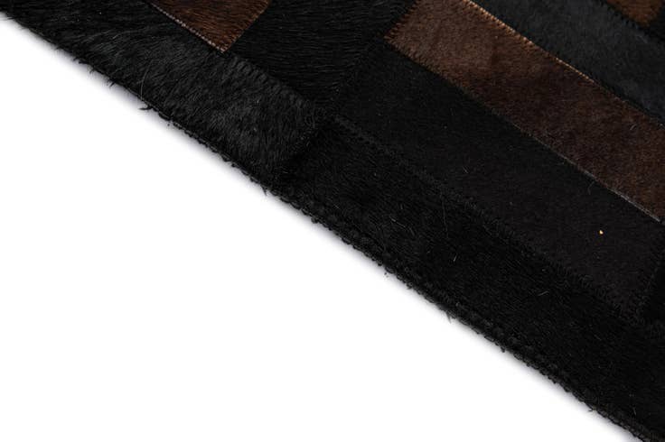 Detail image of 5' 3 x 8' 2 Cowhide - Patchwork Rug