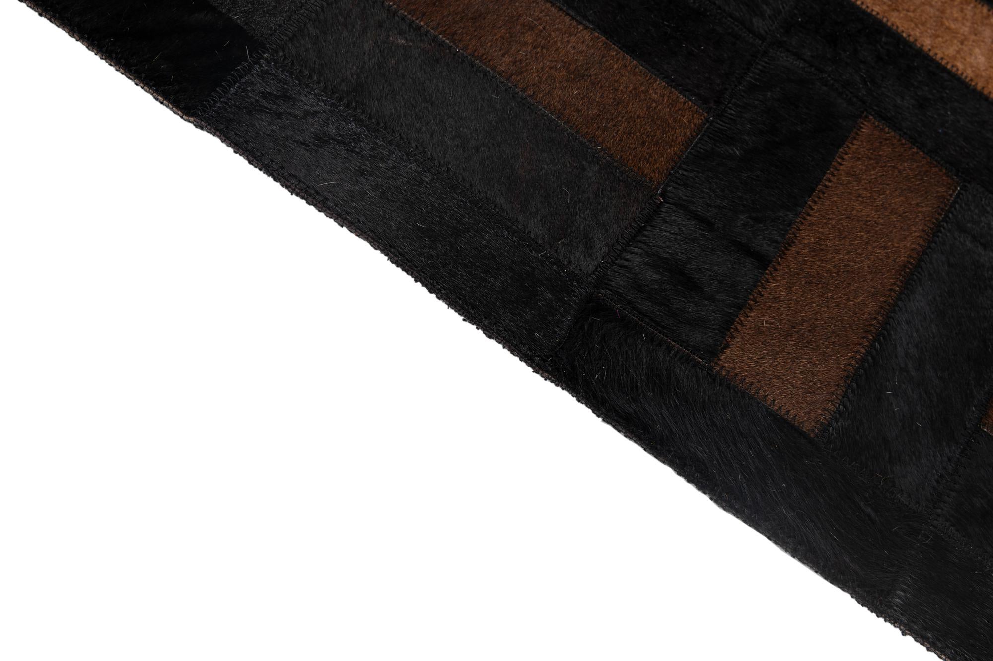 5' 3 x 8' 2 Cowhide - Patchwork Rug