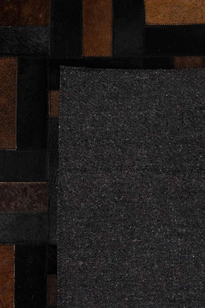 5' 3 x 8' 2 Cowhide - Patchwork Rug