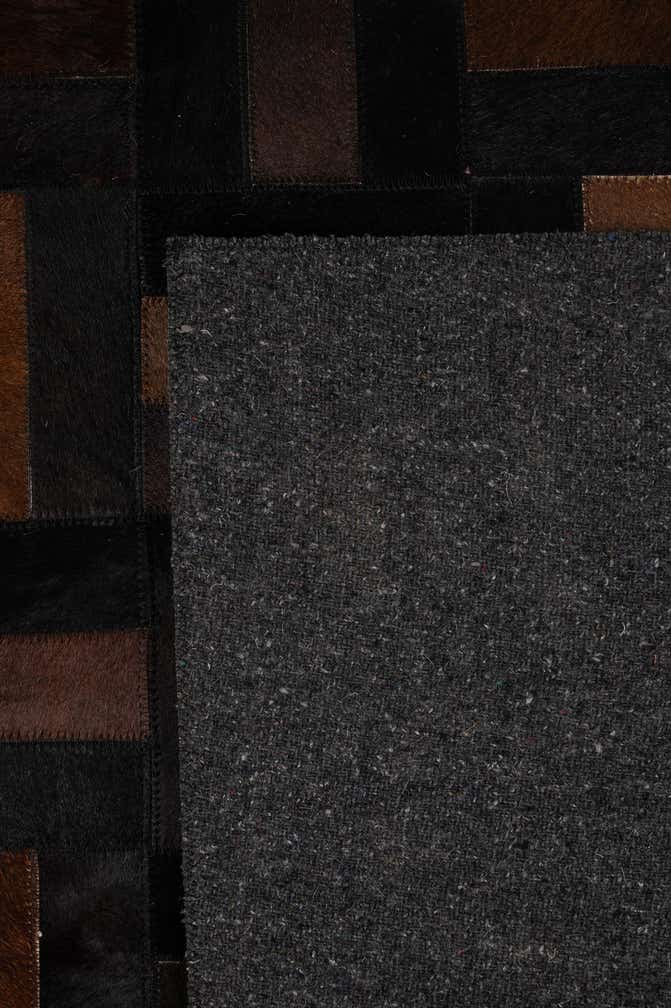 5' 2 x 8' 1 Cowhide - Patchwork Rug