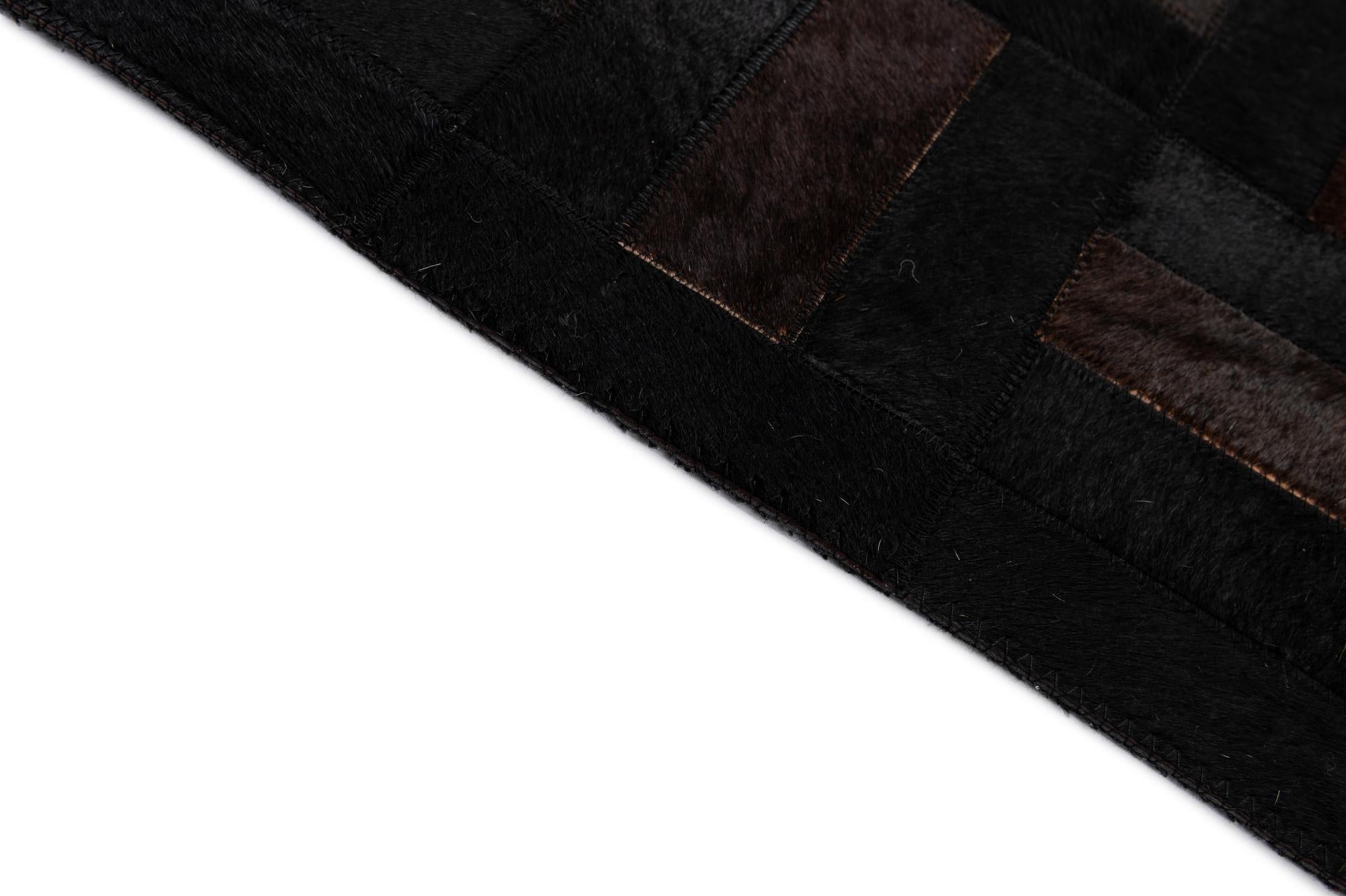 5' 3 x 8' 1 Cowhide - Patchwork Rug