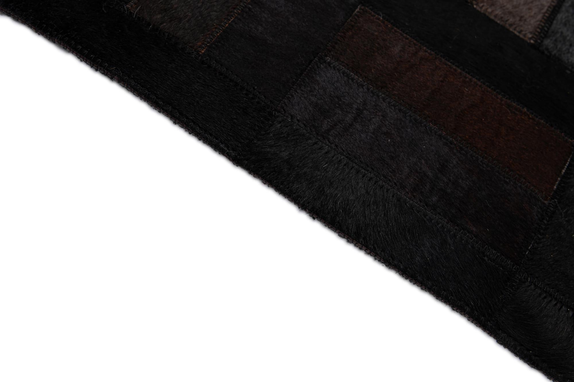 5' 3 x 8' 1 Cowhide - Patchwork Rug