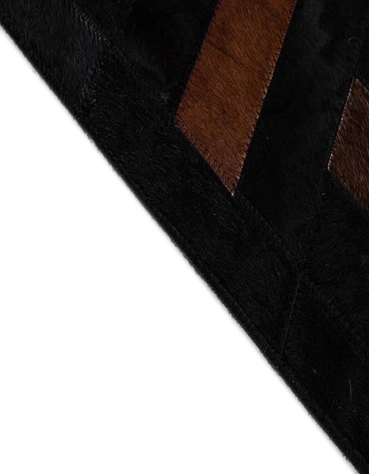 Detail image of 5' 3 x 8' 2 Cowhide - Patchwork Rug