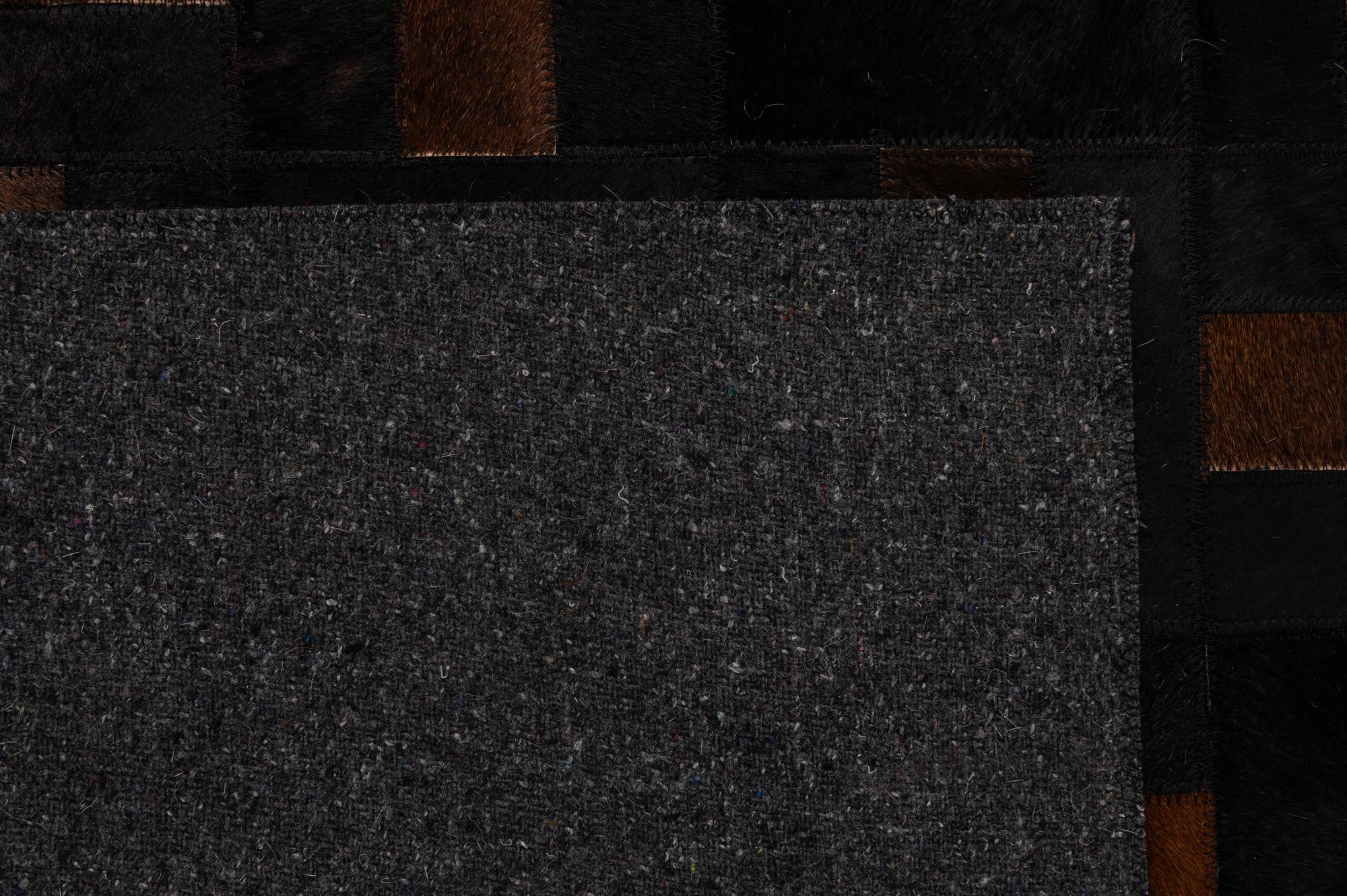 5' 3 x 8' 2 Cowhide - Patchwork Rug