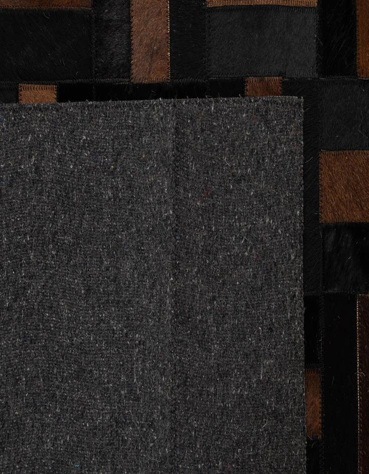 Detail image of 5' 3 x 8' Cowhide - Patchwork Rug