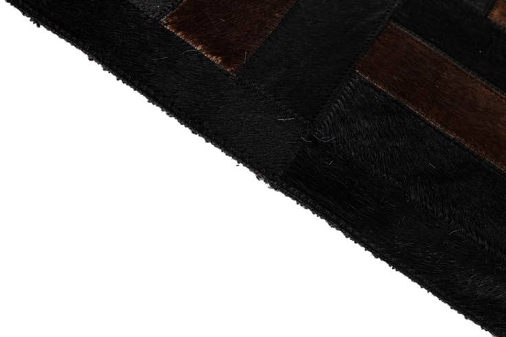 Detail image of 5' 3 x 8' 2 Cowhide - Patchwork Rug