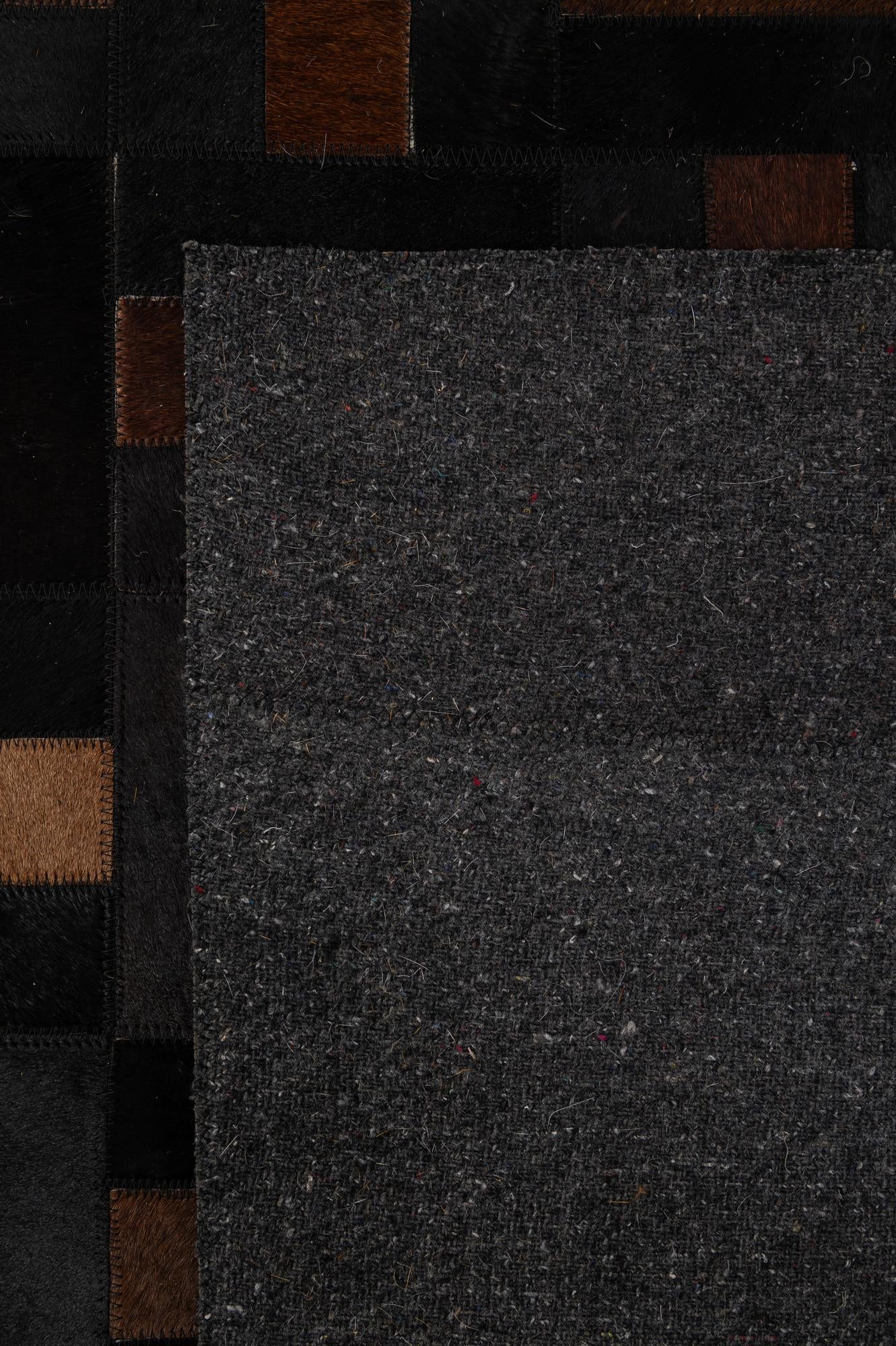5' 3 x 8' 2 Cowhide - Patchwork Rug